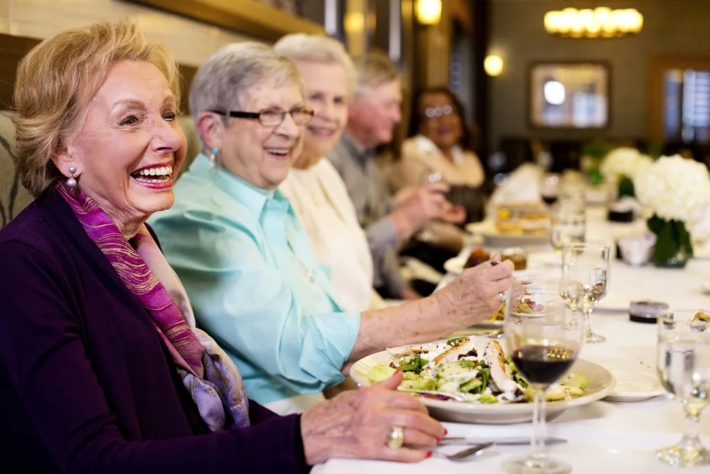 Seniors Socializing and Dining at a Bistro