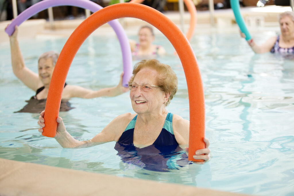 Woman working out in indoor pool