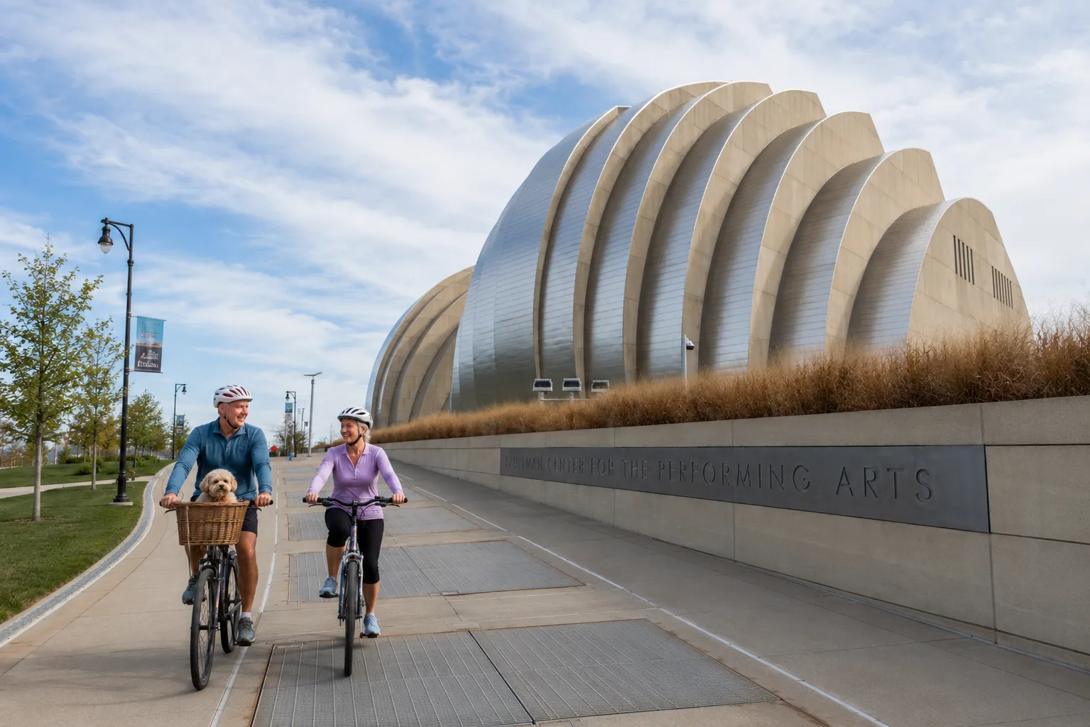 Seniors and a Dog Biking Near the Kaufman Performing Arts Center in Kansas City