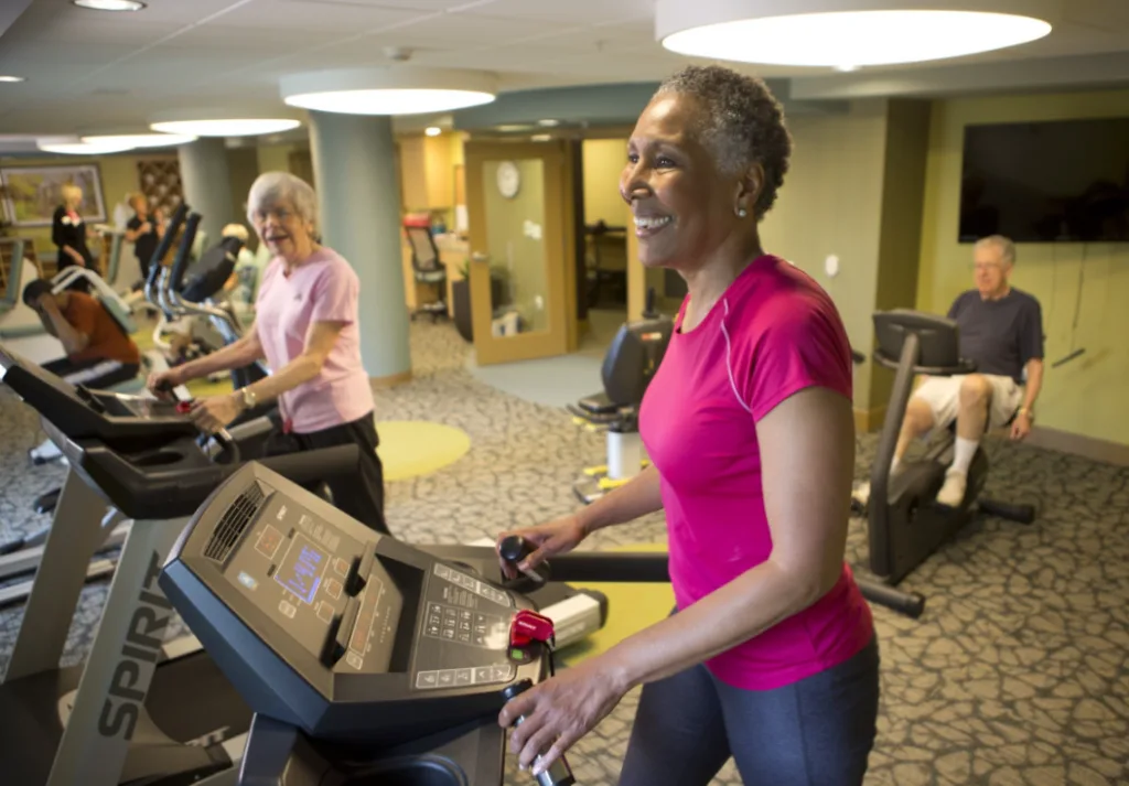 Seniors Exercising in Workout Room